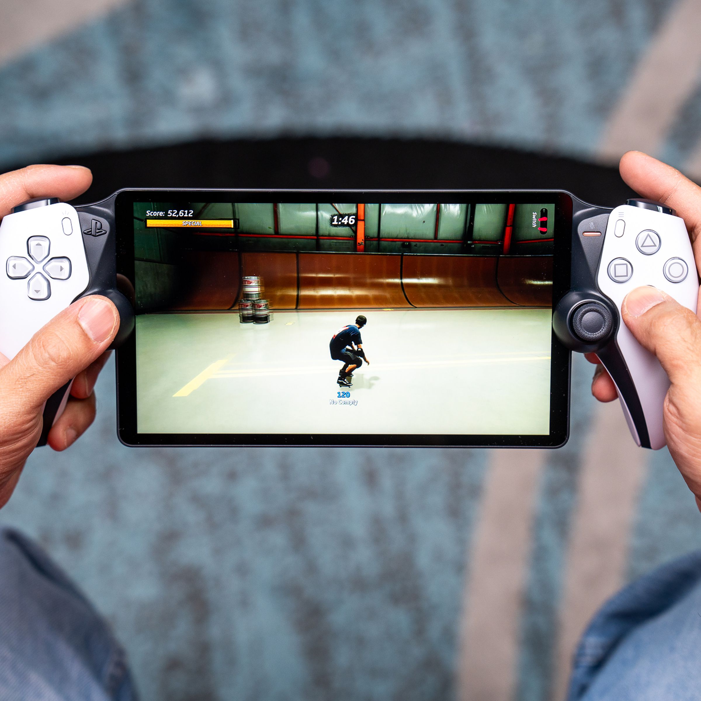 A person playing a PS5 game via Remote Play on the PlayStation Portal.