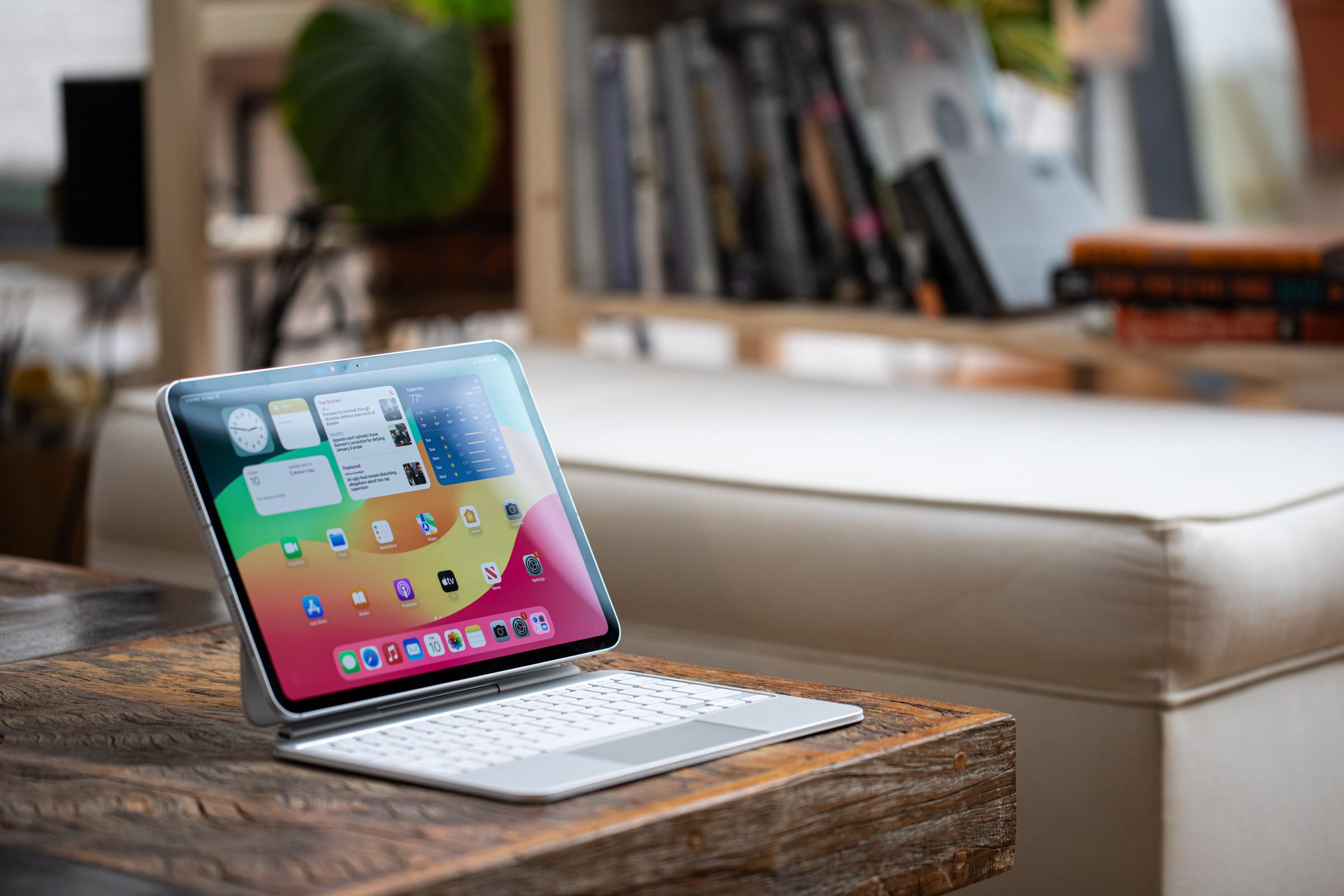 A photo of the iPad Pro on a wooden table.